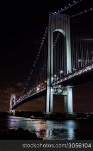 Verrazano bridge at night close up in New York. Verrazano bridge