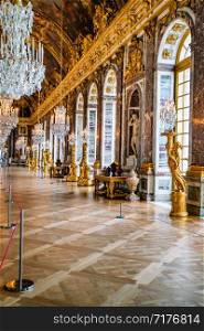 VERSAILLES, FRANCE - February 14, 2018 : The hall of mirrors in the central wing of Palace of Versailles, the residence of the sun king Louis XIV