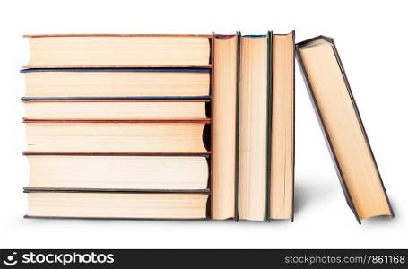 Vertical and horizontal stacks of old books isolated on white background