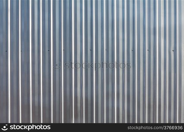 Vertical corrugated galvanized iron plate