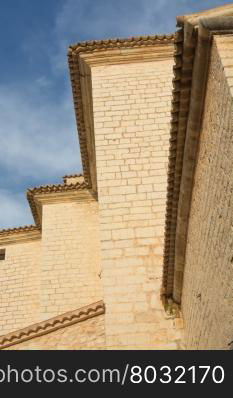 Vertical detail of old stone building in Binissalem, Majorca.