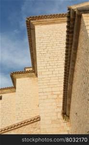 Vertical detail of old stone building in Binissalem, Majorca.