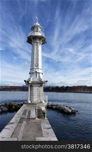 Vertical image of lighthouse on Lake Geneva, Switzerland, on nice autumn day