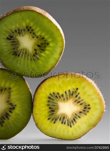 vertical kiwi. vertical sheets of kiwi in gray background