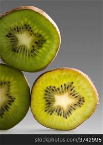 vertical kiwi. vertical sheets of kiwi in gray background