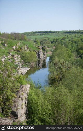 Vertical landscape of river flowing in canyon
