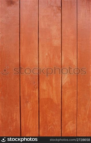 Vertical parallel wooden planks, painted in red