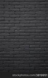 vertical part of black painted brick wall
