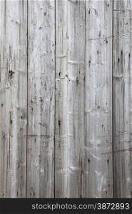vertical part of fence with grey weathered planks