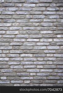 vertical part of wall consisting of grey silver bricks