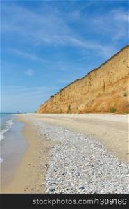 Vertical photo with the sea and clay high shore in Odessa region, Ukraine