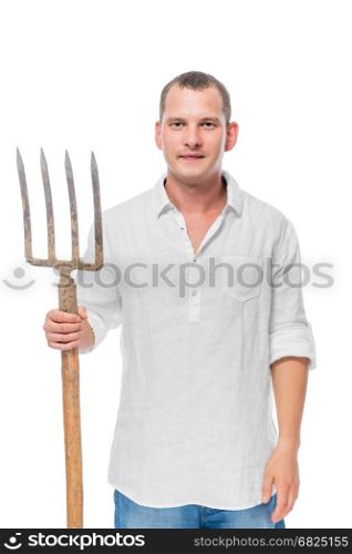Vertical portrait of a farmer with forks in his hand on a white background
