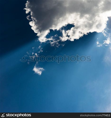 Vertical rays of light through clouds background hd. Vertical rays of light through clouds background