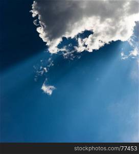 Vertical rays of light through clouds background hd. Vertical rays of light through clouds background