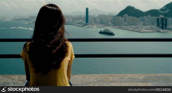 Vertical shot of Macau China with Beautiful strong young woman