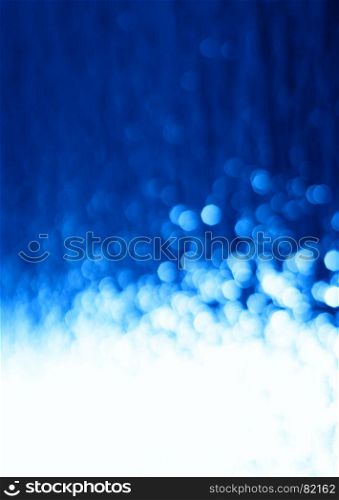 Vertical waterfall with blue bokeh background. Vertical waterfall with blue bokeh background hd