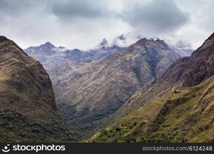 Very beautiful mountains in the dense clouds