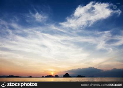 Very beautiful sea sunset with islands on background