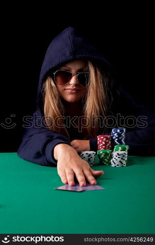 Very beautiful woman playing texas hold&acute;em poker