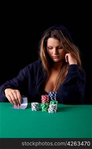 Very beautiful woman playing texas hold&acute;em poker