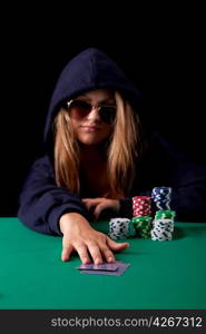 Very beautiful woman playing texas hold&acute;em poker