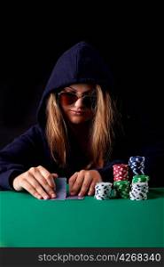 Very beautiful woman playing texas hold&acute;em poker