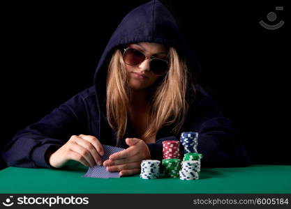 Very beautiful woman playing texas hold&rsquo;em poker