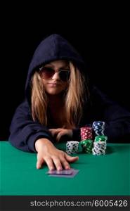 Very beautiful woman playing texas hold&rsquo;em poker