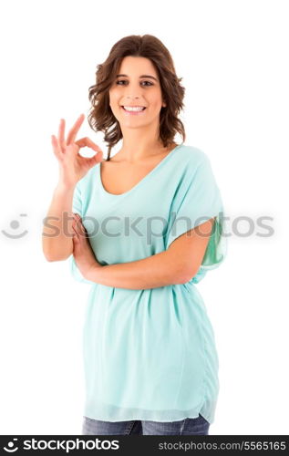 Very beautiful young woman signaling ok, isolated over white