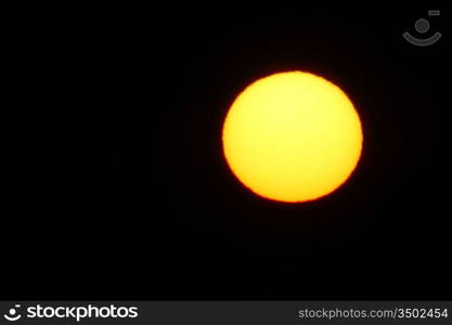 very big yellow sun close up