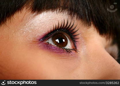 very closeup of girls face with focus on eye