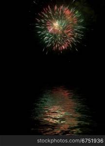 Very Colorfull Fireworks with reflexes on water