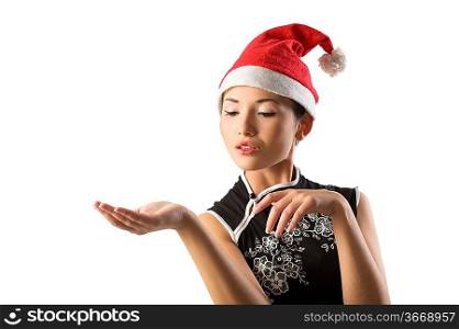 very cute asian girl with red santa claus hat and black shirt