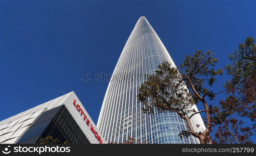 Very high skyscraper. Bottom view. Lotte World Tower, Seoul city, South Korea. January 2018