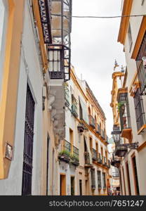 very narrow traditional spanish street. Sevilla, Andalusia. Spain