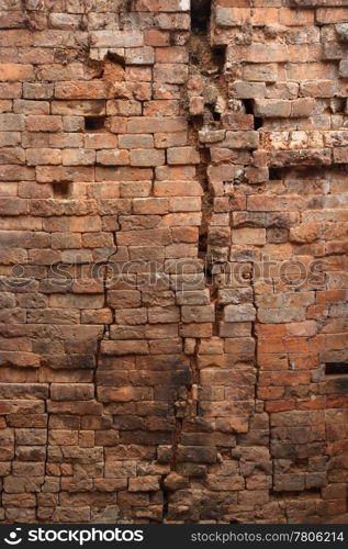 Very old background image of a brick wall that is falling apart.