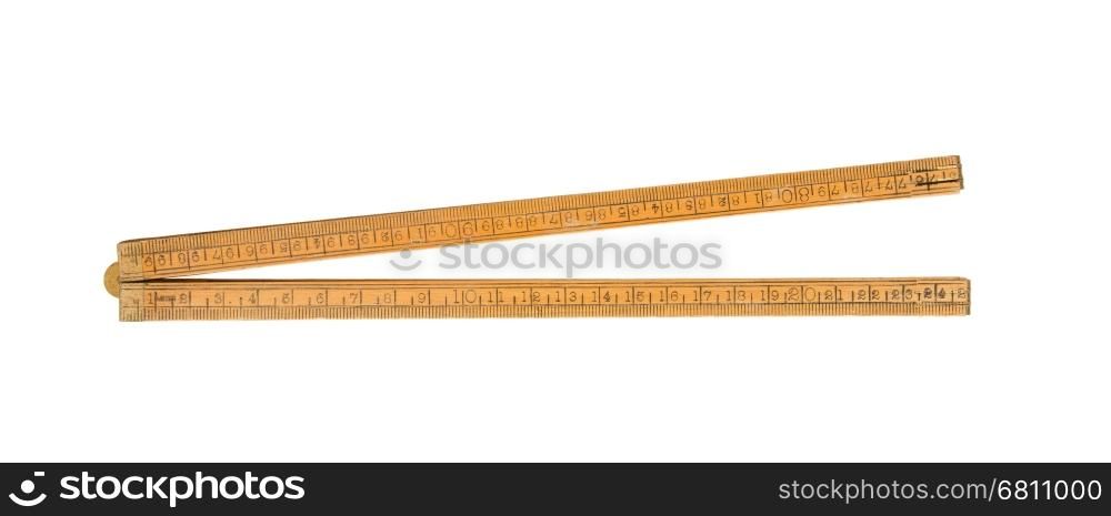 Very old ruler isolated on a white background