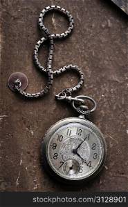 very old watch on the grunge post card