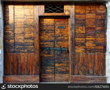 Very old wooden door. Backgrounds and textures: very old wooden door
