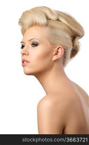 very pretty blonde woman with elegant hairstyle, she is turned of three quarters at right and looks in front of her with dreaming expression