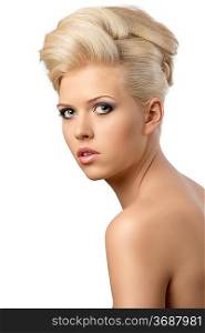 very pretty blonde woman with elegant hairstyle, she is turned of three quarters at right and looks in to the lens with serious expression