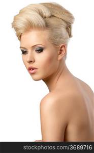 very pretty blonde woman with elegant hairstyle, she is turned of three quarters at right and looks down