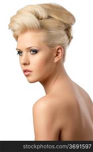 very pretty blonde woman with elegant hairstyle, she is turned of three quarters at right and looks in front of her