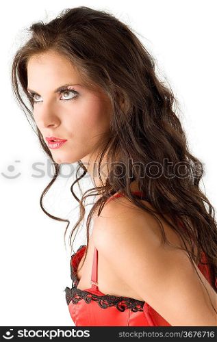 very sexy girl with moved hair wearing a red corset