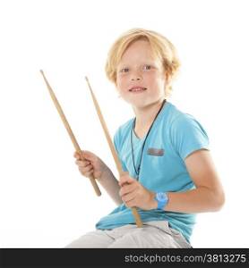 very young drummer against white background