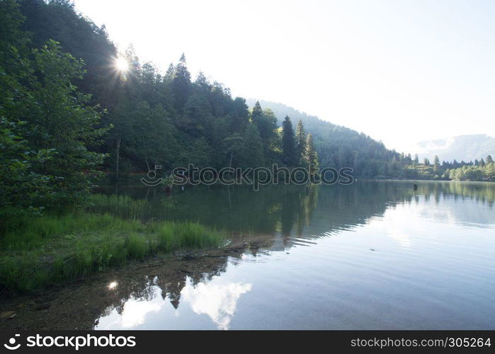 Vew of Karagol (Black lake) a popular destination for tourists,locals,campers and travelers in Eastern Black Sea,Savsat, Artvin, Turkey. Landscape view of Karagol (Black lake) in Savsat,Artvin,Turkey