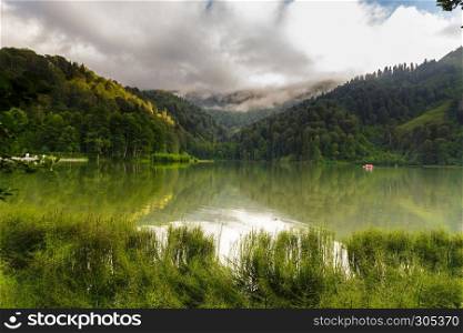 Vew of Karagol (Black lake) a popular destination for tourists,locals,campers and travelers in Eastern Black Sea,Savsat, Artvin, Turkey. Landscape view of Karagol (Black lake) in Savsat,Artvin,Turkey