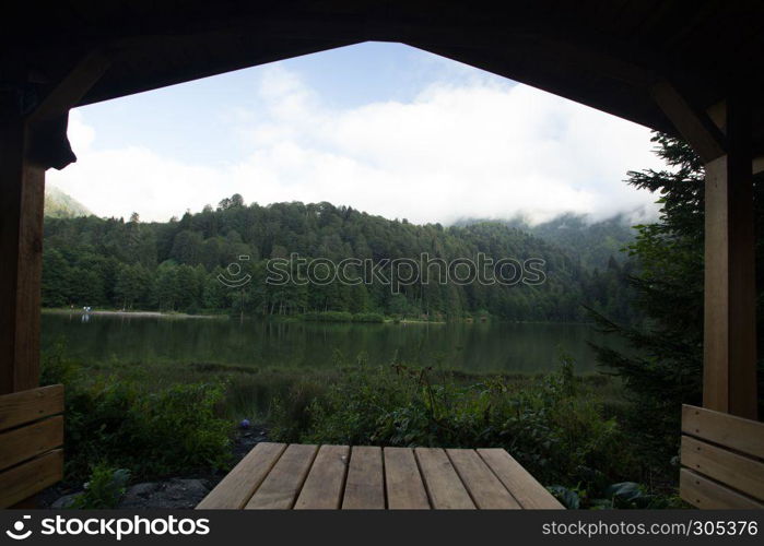 Vew of Karagol (Black lake) a popular destination for tourists,locals,campers and travelers in Eastern Black Sea,Savsat, Artvin, Turkey. Landscape view of Karagol (Black lake) in Savsat,Artvin,Turkey