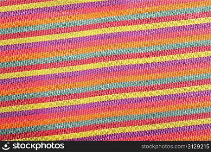 vibrant striped textile, napkin closeup.