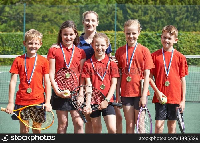 Victorious School Tennis Team With Medals